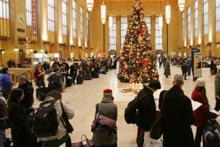 An electrical malfunction near New York City brought train service to a standstill yesterday, delaying holiday travelers at 30th Street Station. Trains from Boston to Washington were delayed for about three hours after a low-voltage reading was detected near a substation leading to a Hudson River tunnel. Service was restored about 11:30 a.m., but most trains were running at or close to schedule by about 4 p.m. Story, A6.