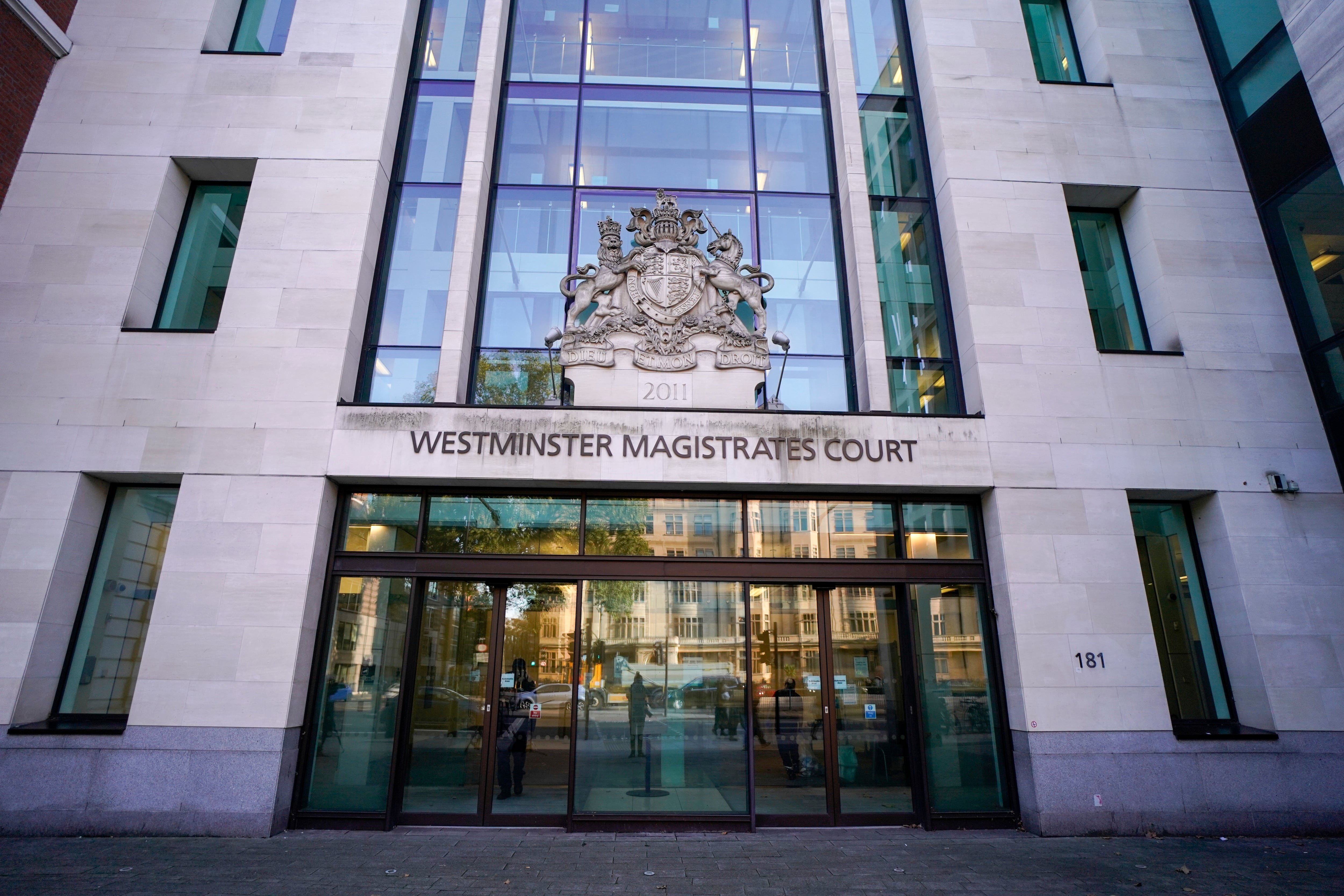 Rwandan doctor accused in London court of overseeing 6 killings in 1994 genocide