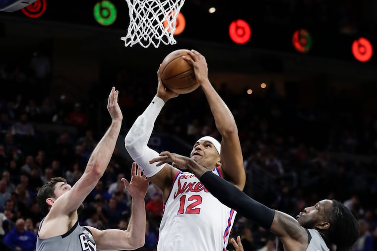Sixers forward Tobias Harris goes to the hoop against the Nets.