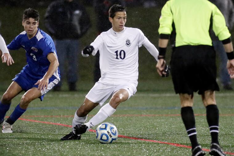 St. Augustine's Antonio Matos runs with the ball against Washington Township at the South Jersey Coaches Tournament.