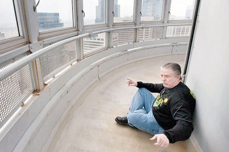 Rick Mariano returns to City Hall observation tower. (JESSICA GRIFFIN/STAFF PHOTOGRAPHER)