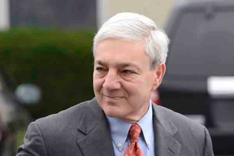 Former Penn State president Graham Spanier arrives at Harrisburg District Judge William Wenner's office Wednesday Nov. 7, 2012 in Harrisburg, Pa. Spanier was arraigned and released on bail at the brief court appearance on charges he lied about and concealed child sex abuse allegations involving former assistant football coach Jerry Sandusky. (AP Photo/Jason Minick)