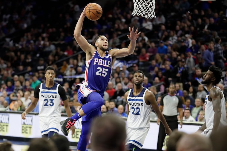 Sixers Ben Simmons about to dunk the basketball late in the 4th quarter of the Minnesota Timberwolves at the Philadelphia 76ers NBA game at the Wells Fargo Center in Phila., Pa, on October 30, 2019.