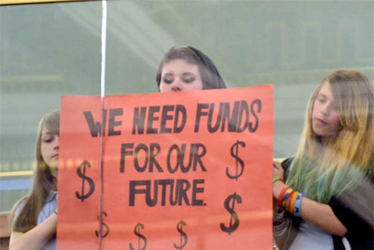 Students press City Council to provide the school district with additional funding to avoid more than 1,000 layoffs.