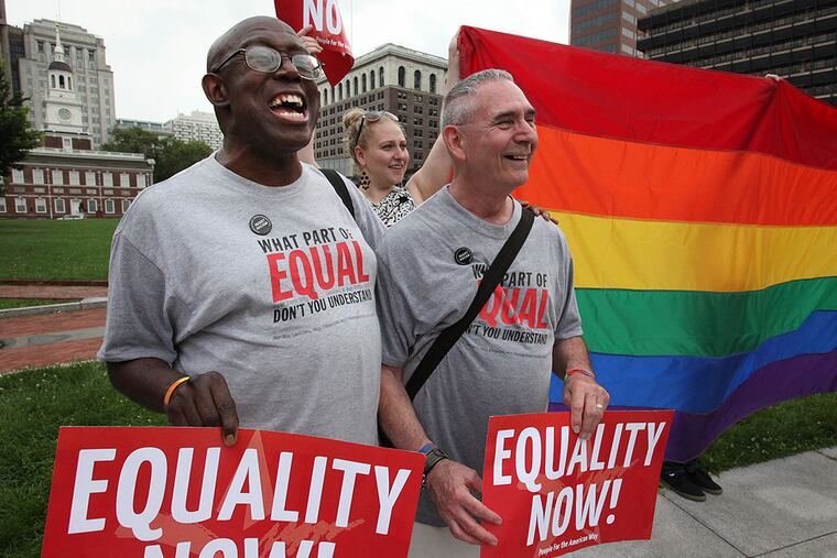 Stevie Martin-Chester (left) and his husband, Arthur Martin-Chester, of Norristown, at a June 2013 rally at Philadelphia's Independence Mall in support of gay marriage.