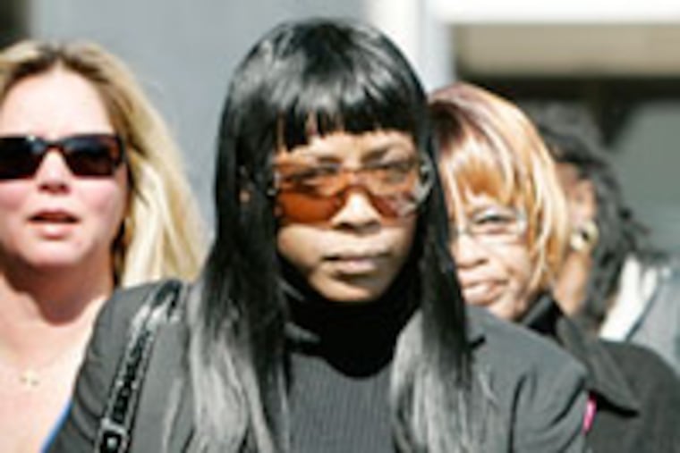 Tamika Riley leaves the U.S. District Courthouse in Newark, N.J. A federal jury found her guilty today on corruption charges stemming from the cut-rate sale of city land, along with former Newark Mayor Sharpe James.