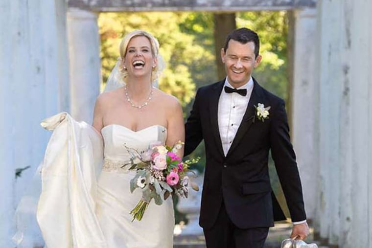 Susan Gausch and Mark Beekman were married in Greystone Hall in West Chester. They entered the reception in safari gear, complete with binoculars and stuffed monkeys. (John Shetron Photography)