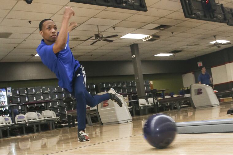 Christopher Johnson, a senior at Lankenau High School, is heading to a North Carolina college on a bowling scholarship that will cover his room and board all four years. At Erie Lanes, Wednesday May 30, 2018