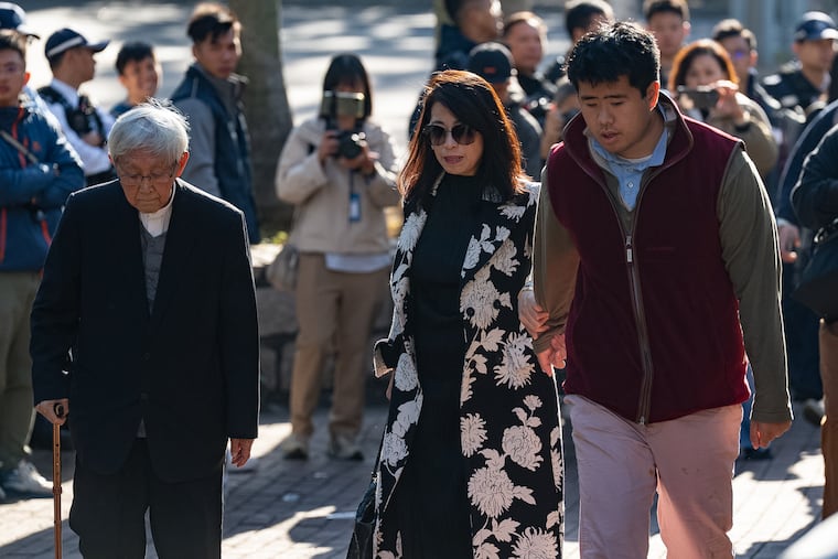Retired Chinese cardinal Joseph Zen Ze-Kiun, from left, Jimmy Lai's wife Teresa Lai, and Jimmy Lai's son Augustin Lai arrive at the West Kowloon Magistrates' Courts ahead of the verdict for activist publisher Jimmy Lai's national security trial in Hong Kong, Monday, Dec. 15, 2025.