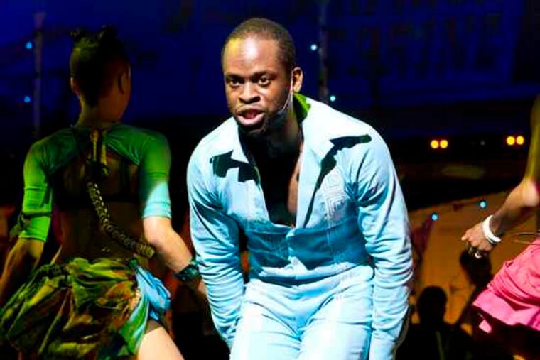 Fela performing in Paris in 1986, above. The Nigerian singer is played in the Broadway musical "Fela!" by Sahr Ngaujah, left.