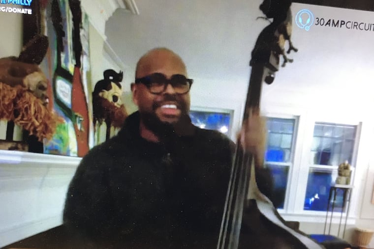 Christian McBride playing in his Montclair, N.J. living room during the Love From Philly virtual music fest on Saturday night.