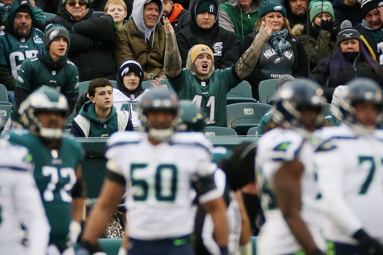 An Eagles fan reacts after quarterback Carson Wentz was sacked in the second quarter of the team's 17-3 loss to the Seattle Seahawks on Sunday.