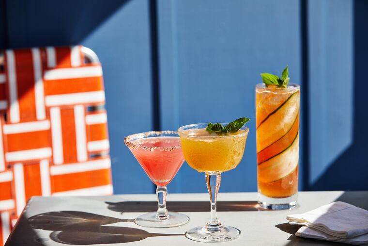 A spicy watermelon margarita (left), a Golden Daquiri (center) and a Garden Pimm's Cup (right).