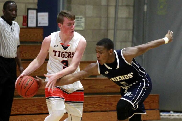 Germantown Friends School senior guard Peter Gard (No. 3, left) has drilled 53 three-pointers in 15 games.