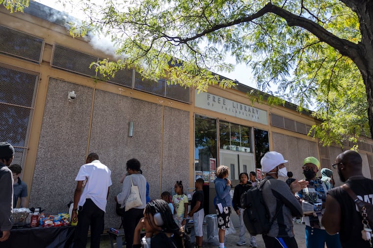 People in the community come out for a meeting and cookout to discuss the funding and renovations for the Cecil B. Moore Library on Saturday, Aug. 29, 2026, in Philadelphia.