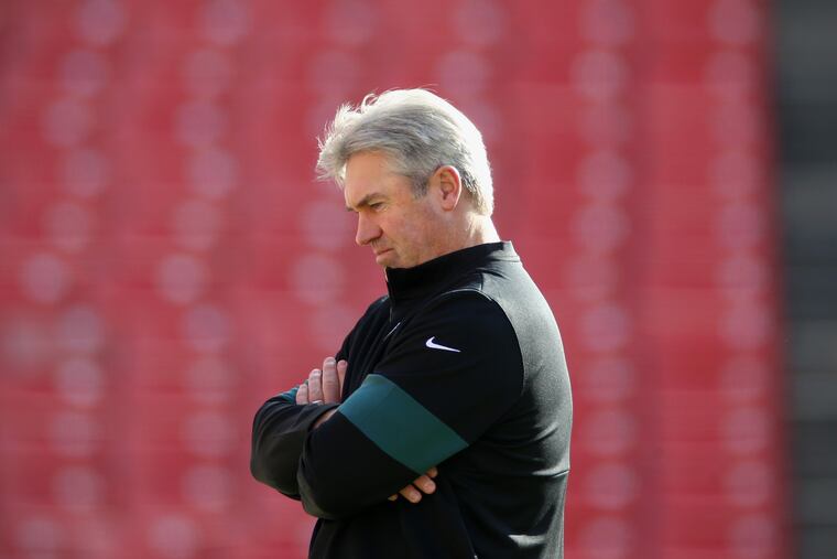Doug Pederson, here contemplating his chances before a game at Washington, doesn't spare the rod or spoil the child.