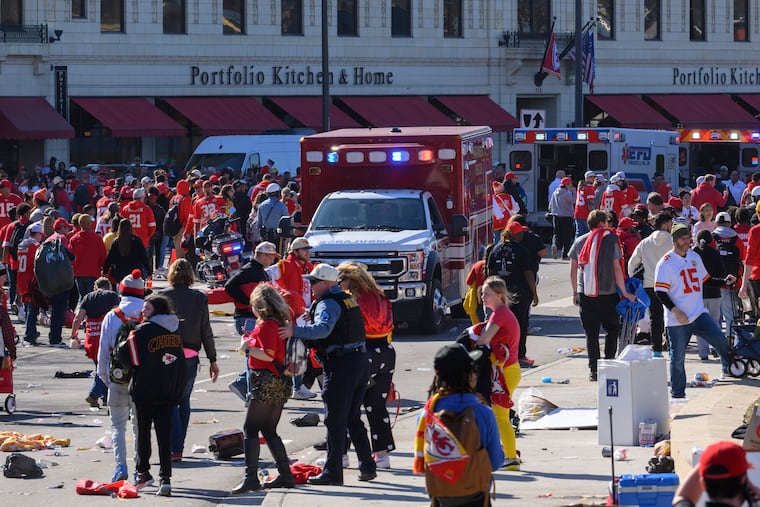 Police clear the area following a shooting at the Kansas City Chiefs Super Bowl parade on Wednesday.