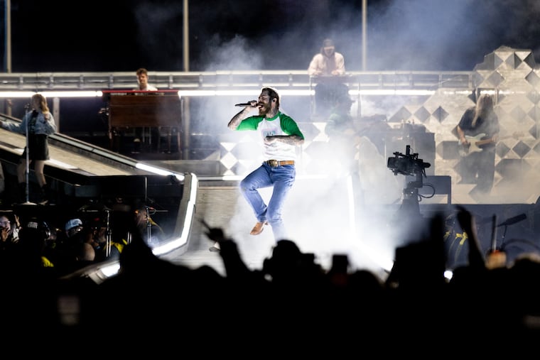 Post Malone performs during at Citizens Bank Park Saturday. In his nearly two-hour set, Posty played trap-pop hits like “Psycho” and “Wow,” then shifted to alt-rock jams like “Circles” and folk, country anthems like “Dead At The Honky Tonk.”