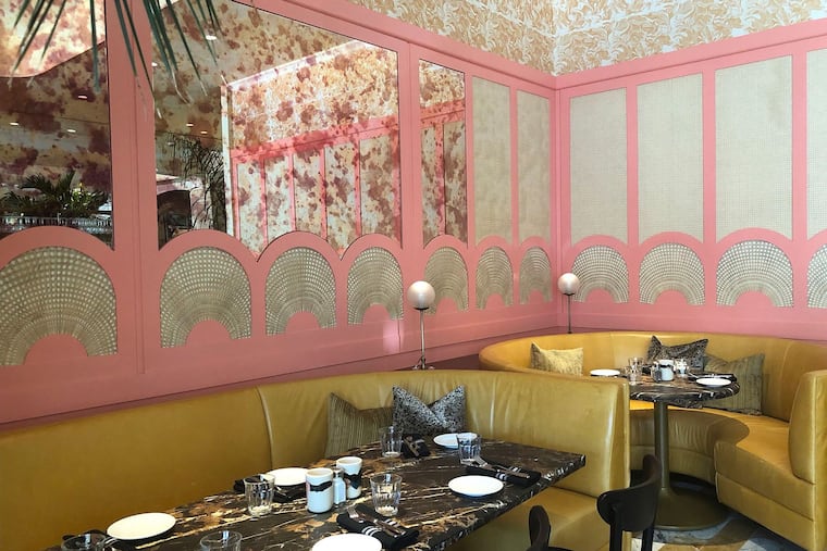 A dining room at Louie Louie, 3611 Walnut St.