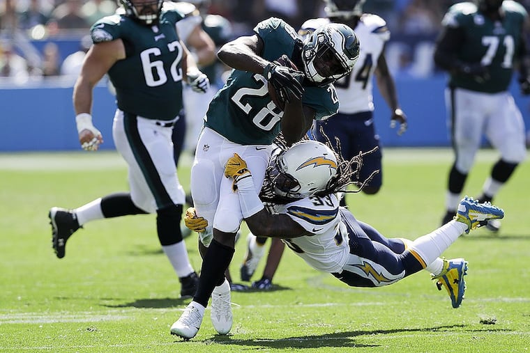 Eagles running back Wendell Smallwood runs with the football against Los Angeles Chargers free safety Tre Boston.