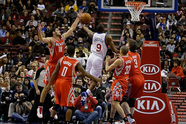76ers guard James Anderson drives to the basket. (Matt Slocum/AP)