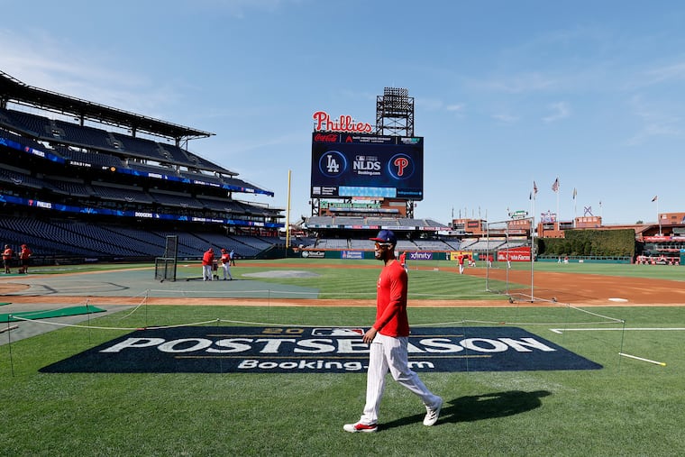 Phillies pitcher Cristopher Sanchez walks the Citizens Bank Park field after working out on Oct. 3.
