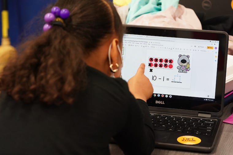 Saniah Keel, 6, works on a math learning game on a computer at the Victorino Boys & Girls Club in Philadelphia, April 22, 2021. The Victorino Boys & Girls Club is one of Comcast's "Lift Zones," community centers that offer free WiFi to low-income residents who cannot afford or access the internet at home.