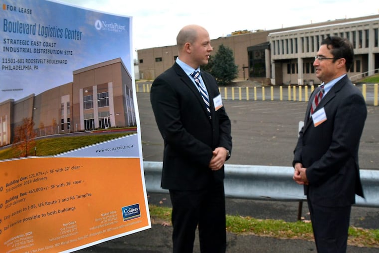 Colliers International brokers (L-R) Tom Golarz,L, and Richard S. Gorodesky outside of the Northeast Philadelphia buildings that are being redeveloped into a new warehouse complex called the Boulevard Logistics Center.