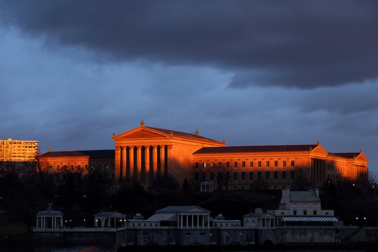 The sun illuminates the Philadelphia Museum of Art as it sets on March 7, 2024.