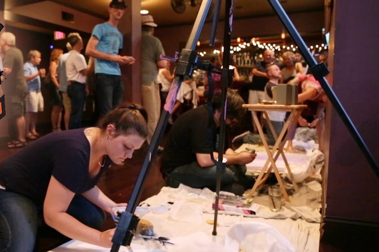 Artists compete at the 2017 Lehigh Valley Art Wars finale held at Two Rivers Brewing in Easton, Pa.