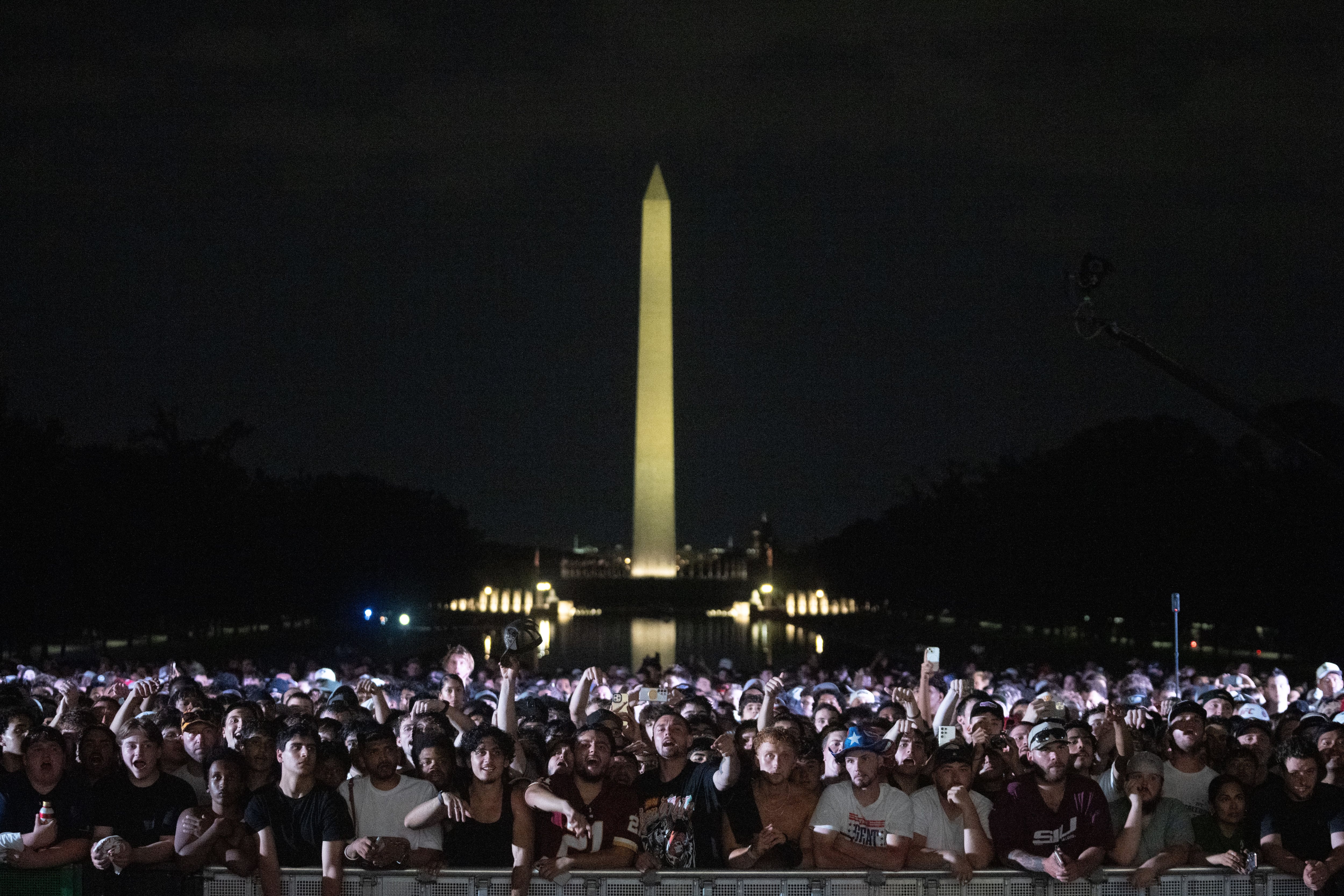 Trump hosts UFC fight night at the White House, drawing thousands to Washington