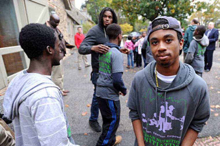 Matthew Johnson, 19, who helped write the first Youth Food Bill of Rights, at a groundbreaking ceremony at Bartram's Garden.