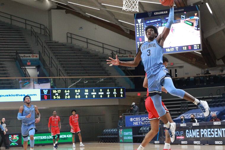 Brandon Slater of Villanova goes up for a dunk against St. John’s during the first half of Tuesday's 81-58 win.
