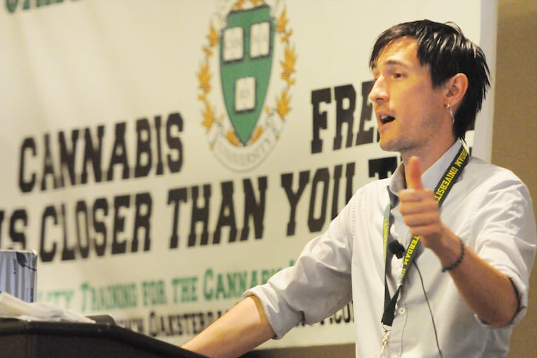 Horticulture instructor Joey Ereneta talks to attendees of the marijuana conference at Bally's in Atlantic City, NJ on Sunday, August 24, 2014.