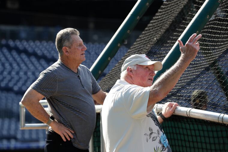 Charlie Manuel (right) and Larry Bowa have become unlikely friends.