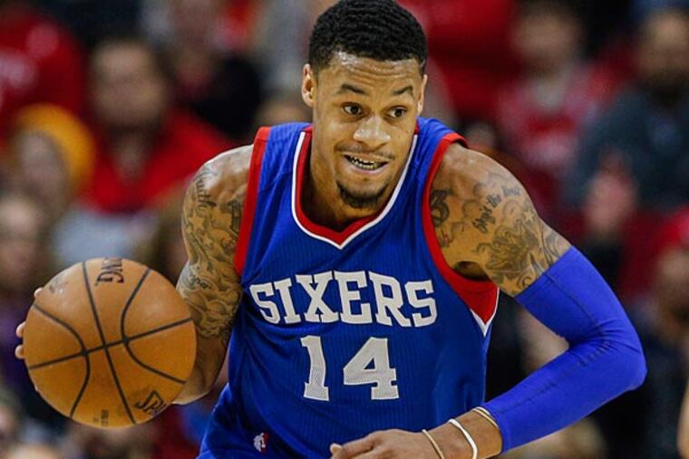 Philadelphia 76ers guard K.J. McDaniels (14) brings the ball up the court during the fourth quarter against the Houston Rockets at Toyota Center. The Rockets defeated the 76ers 88-87. (Troy Taormina/USA Today)