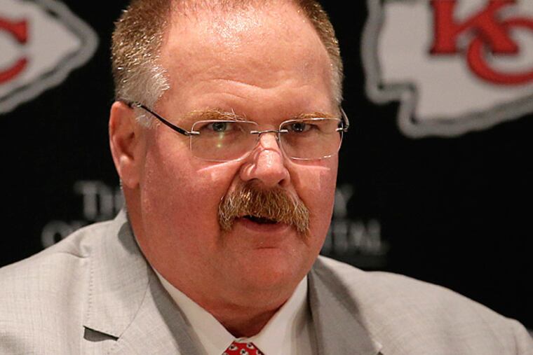 Given perhaps one last chance to throw somebody from the Eagles under the bus, Andy Reid took the road he traveled for 14 years in Philadelphia. (Charlie Riedel/AP)