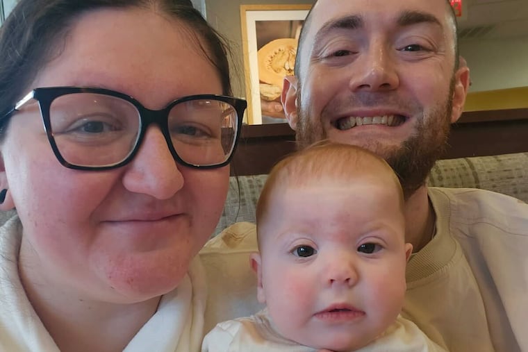 Julia Hess (left), her partner, and baby Jasmine. The family is bracing for early intervention services from the Bucks County IU to be disrupted.