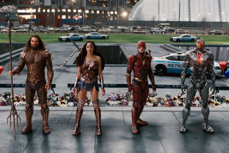 This image released by Warner Bros. Pictures shows Jason Momoa, from left, Gal Gadot, Ezra Miller and Ray Fisher in a scene from "Justice League."