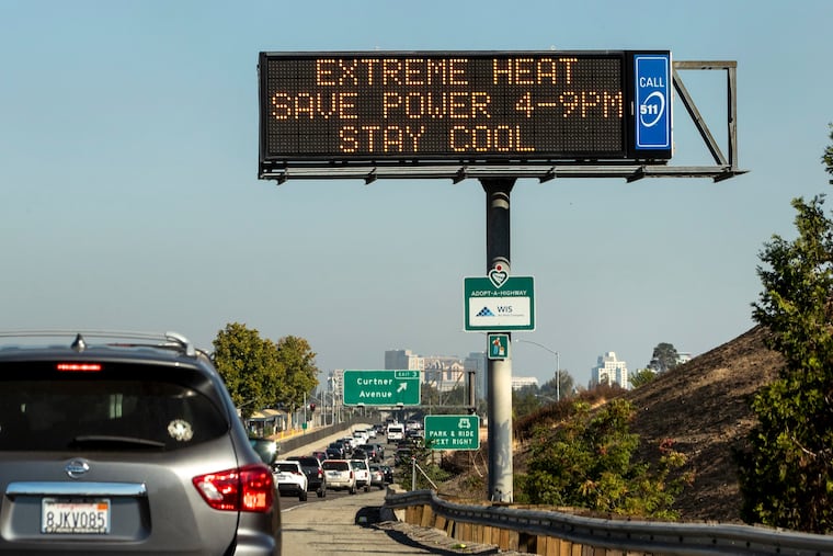 Extreme heat advisory signs are displayed on Highway 87 message boards in San Jose, California, on Sept. 1, 2022. (Karl Mondon/Bay Area News Group/TNS)