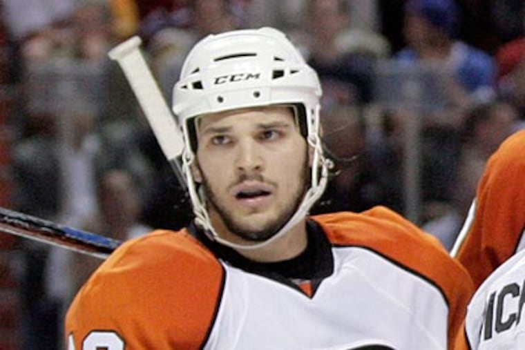 "It's tough to not play," Dan Carcillo said. "But you've just got to look at the bigger picture. (Yong Kim / Staff Photographer)