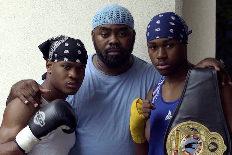 (Left to right) Rock Allen , his father Naazim Richardson, and brother, Bear Richardson.