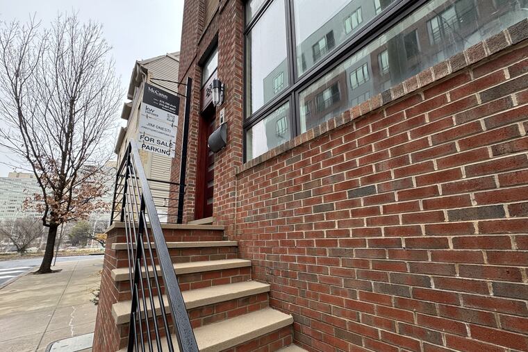 A sign advertises a home for sale in Center City on March 7.