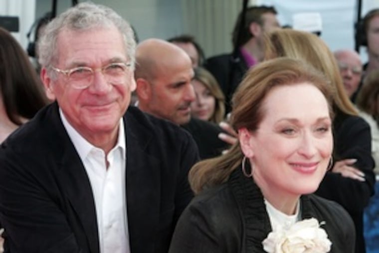 Director Sydney Pollack and actress Meryl Streep, left, at a screening of "The Devil Wears Prada." In a scene from "Absence of Malice," above, Pollack directs Paul Newman.
