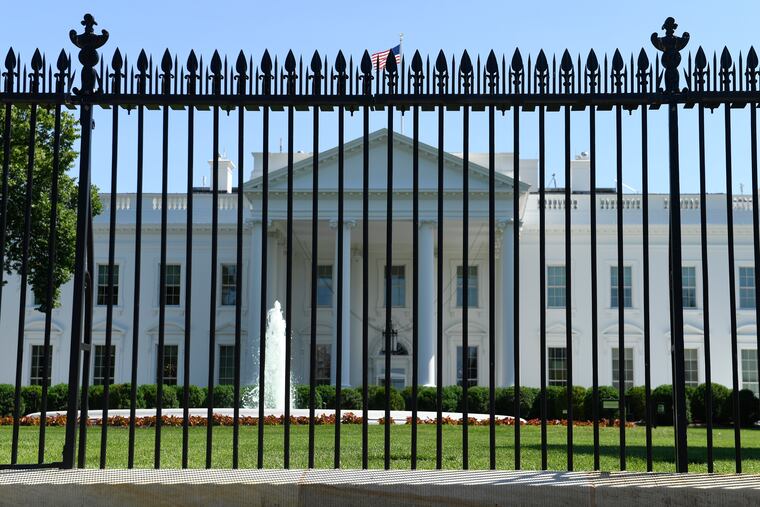 The fence surrounding the White House on Pennsylvania Avenue in Washington, Friday, May 24, 2019. Approval was given for a new and taller fence around the White House complex in 2017 and now construction of a almost 13-foot tall fence is slated to begin this summer.