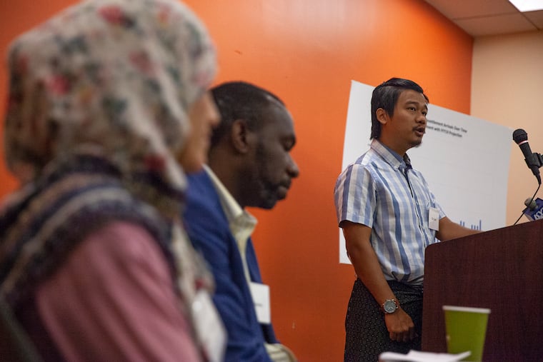 Gin Sum, originally from Myanmar, speaks during a panel discussion about refugees and resettlement, as agency officials condemn the Trump administration's effort to reduce admissions.