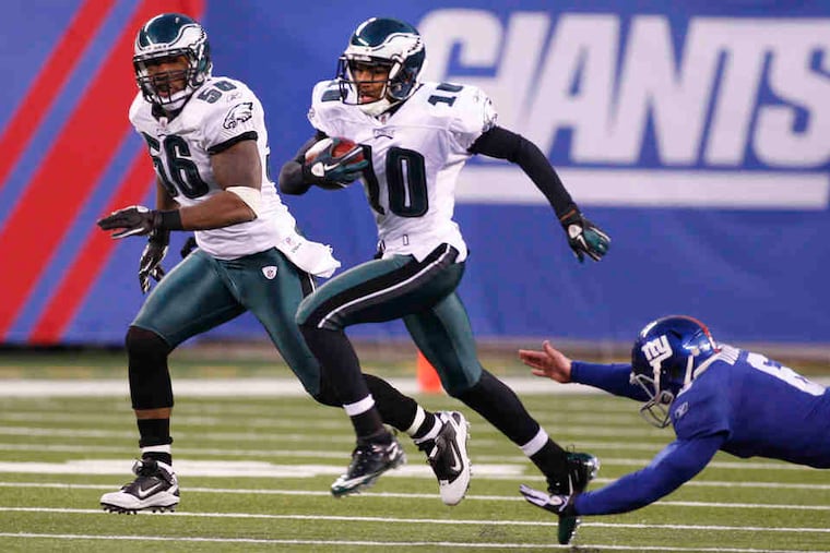 As the clock runs out, DeSean Jackson races away from the Giants' Matt Dodge, who failed to punt the ball out of bounds. The touchdown was the Eagles' fourth straight, overcoming a 31-10 deficit.