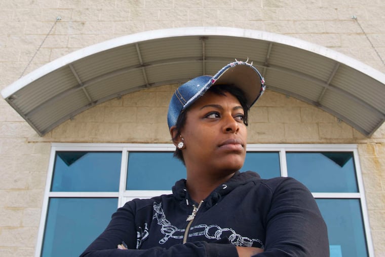 Latoya Cobb, in front of the now-shuttered Star Career Academy in Northeast Philadelphia.