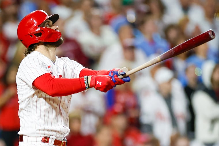 Phillies first baseman Bryce Harper hits the second of his two home runs during NLDS Game 3 against the Braves.