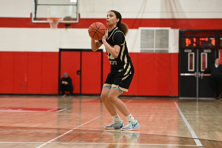 Neumann Goretti freshman Reginna Baker goes for a shot against Archbishop Carroll this past season. Baker is playing for the Philly Belles 16U team this summer.